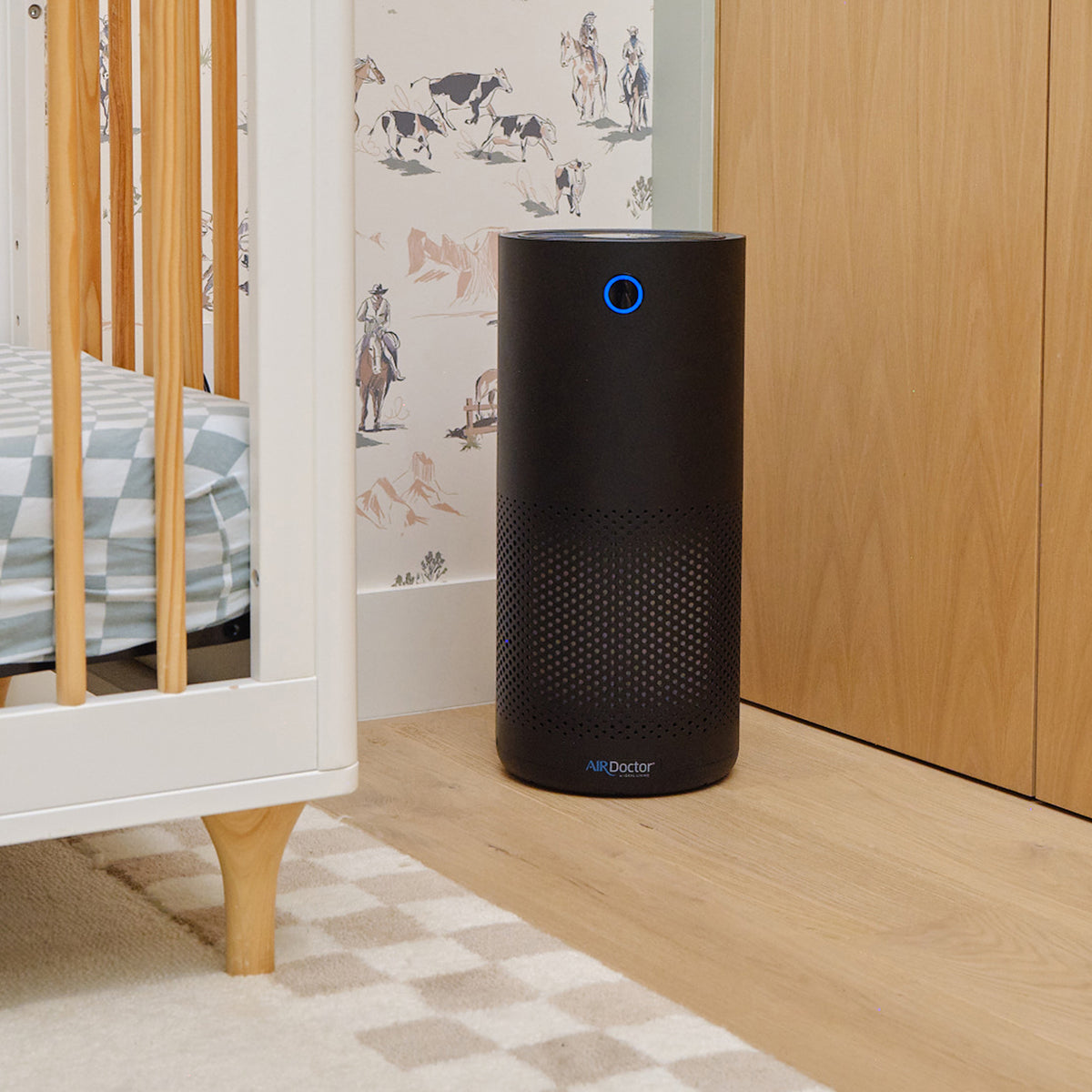 A lifestyle image of an AD1500 air purifier in a nursery.