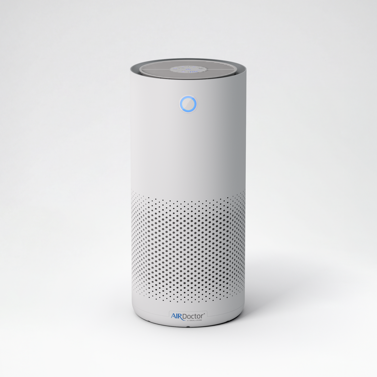 A white cylindrical smart air purifier with a perforated lower grille and a blue indicator light, standing on a light gray background. The brand name 'AIRDoctor' is visible at the bottom.