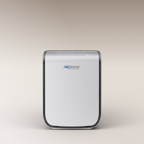 AirDoctor 2000 standing in front of a beige background.