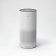 A white cylindrical smart air quality monitor with a perforated lower grille, a blue indicator light, and the AIRDoctor logo near the base, set against a clean white background.