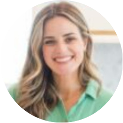 Circular profile picture of a person with shoulder-length hair wearing a green shirt.